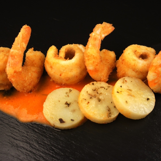 Battered sole and prawns with scented potatoes