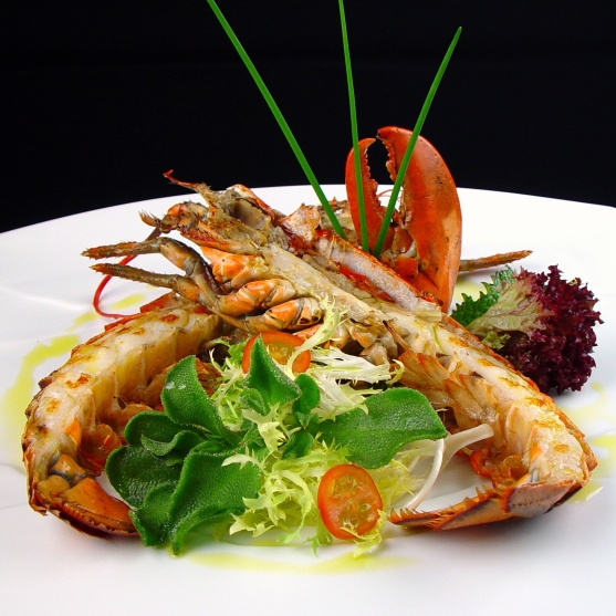 Grilled clawed lobster with smoked rosemary oil
