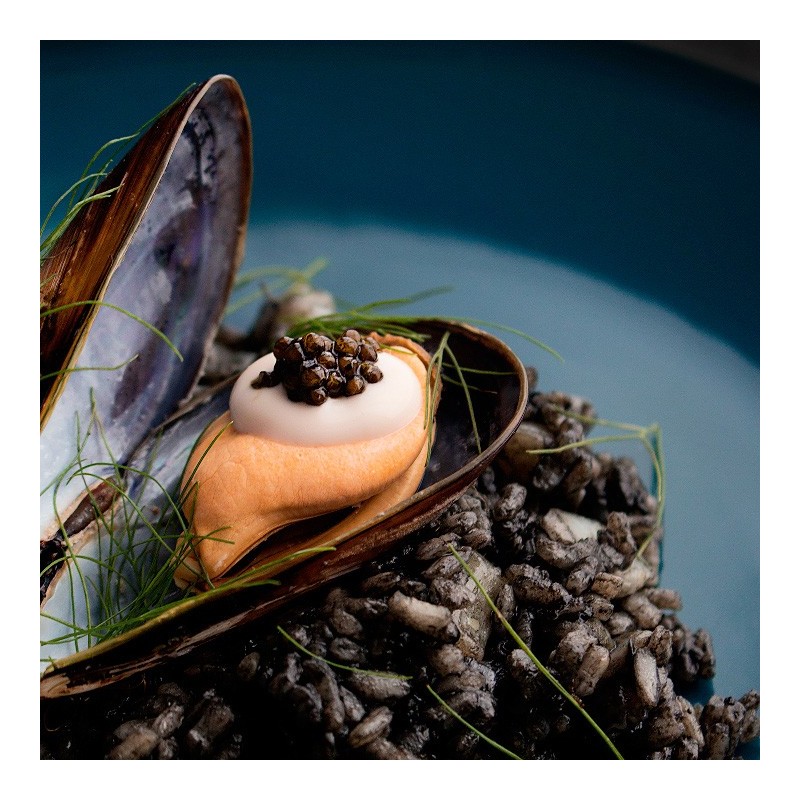 Black rice with alioli and caviar del tíbet