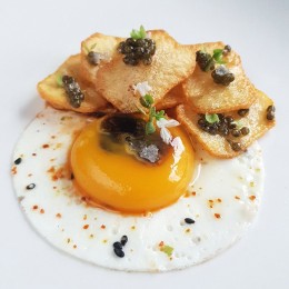 Pulpo con patatas confitadas y Caviar